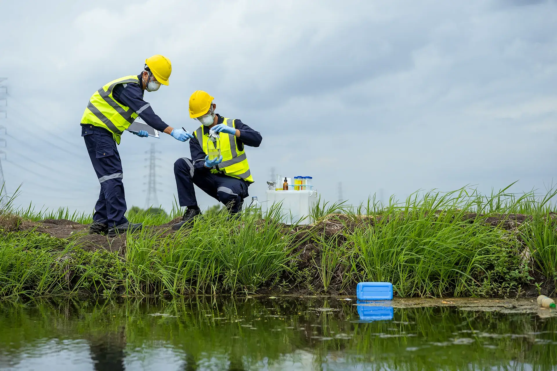 Two professional workers testing soil